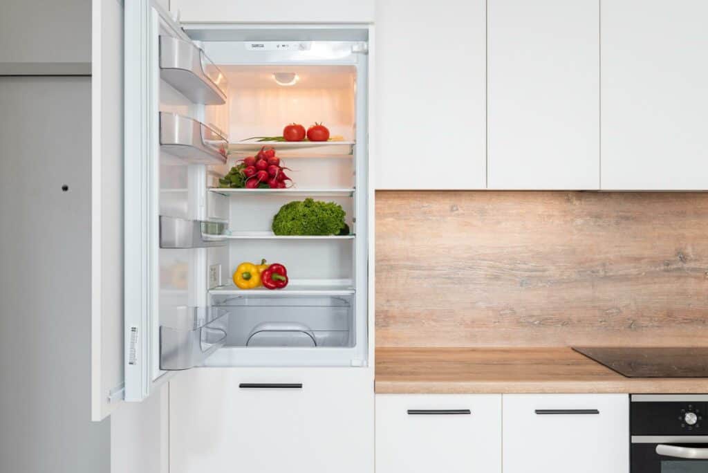 A refrigerator with vegetables