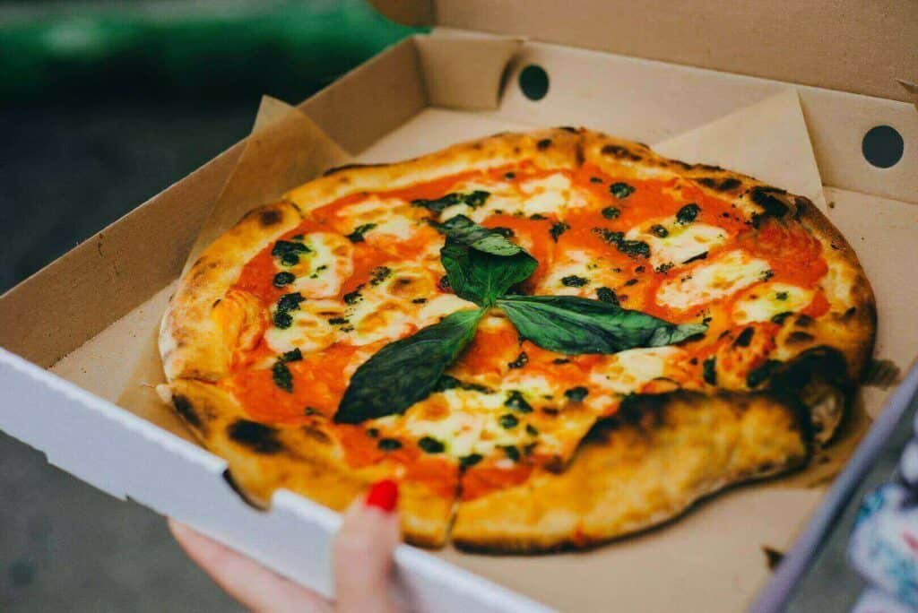 A pizza Margherita in a box
