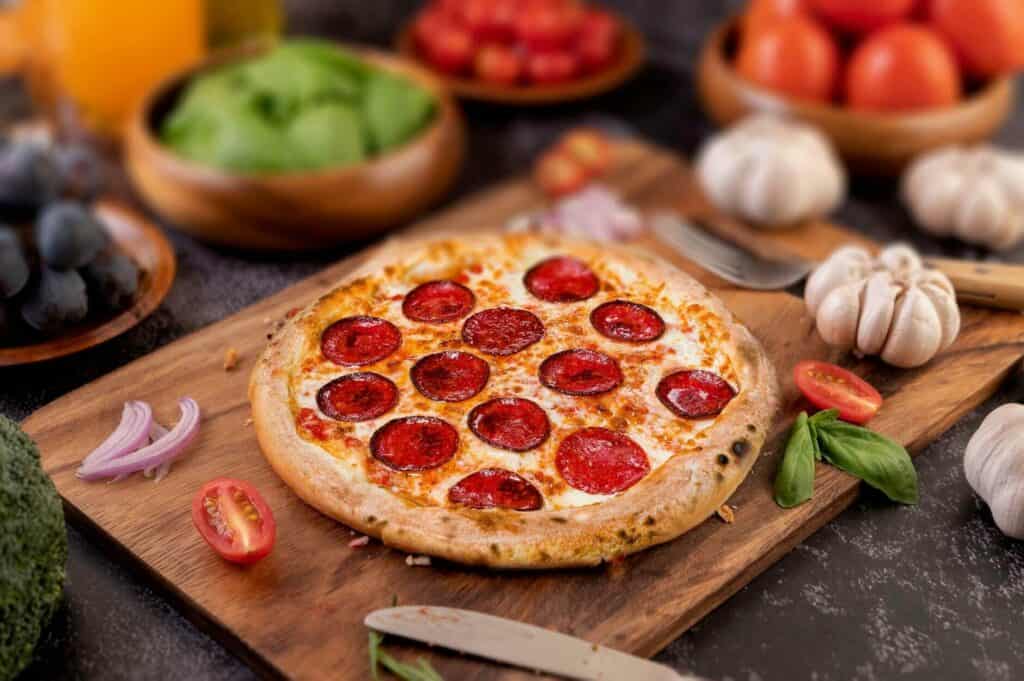 Pizza on a wooden cutting board