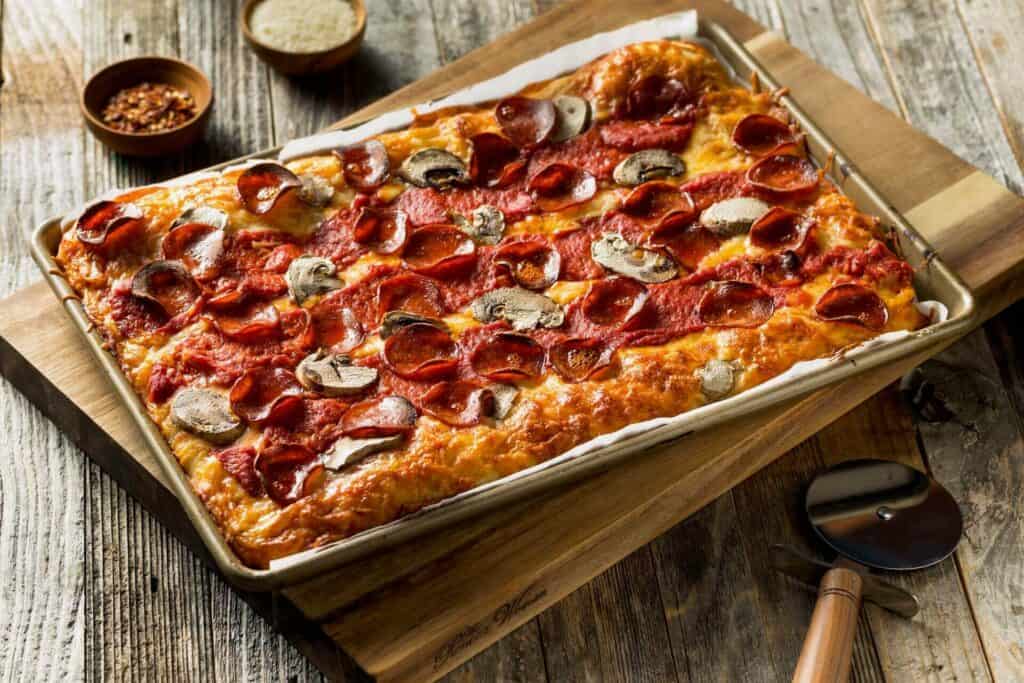 Detroit-style pizza on a wooden board